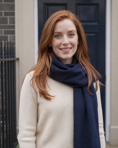 Siobhan, 29, Irish woman with auburn hair smiling in Dublin for dating profile