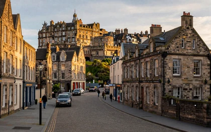 Edinburgh Old Town with castle on hilltop and cobblestone Royal Mile