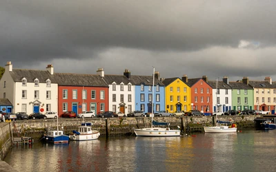 Colorful houses along Galway waterfront harbor in Ireland
