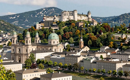 Salzburg old town with Hohensalzburg Fortress and Salzach River in a sunny day