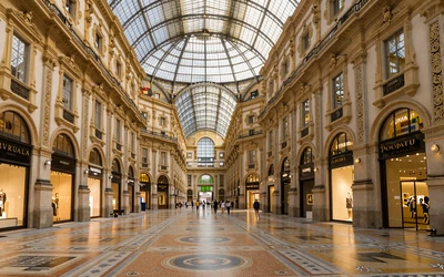 Milan Galleria Vittorio Emanuele II interior with ornate glass ceiling and elegant architecture