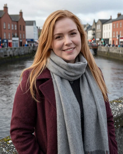 Niamh, 31, strawberry blonde Irish woman near the River Lee in Cork city