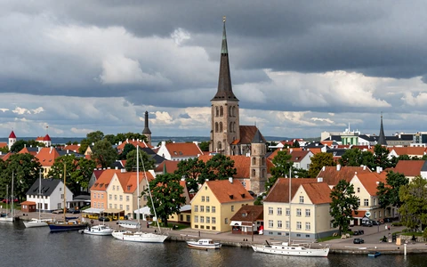 Liepaja Latvia coastal city with historic harbor buildings and sandy beach
