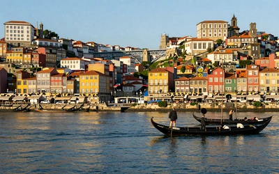 Porto Ribeira district with colorful buildings along the Douro River and Dom Luis I Bridge